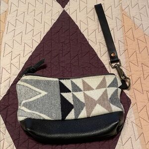 Meant manufacturing Pendleton wristlet purse.
